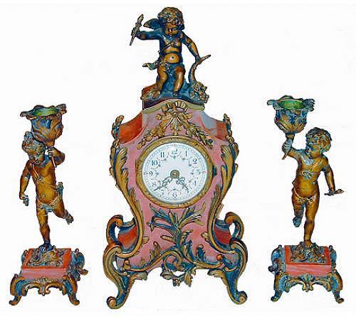 A 19th Century Louis XV en Suite Marble and Bronze Mantle Clock and Pair of Candlesticks No. 2395 A 19th Century Louis XV en Suite Marble and Bronze Mantle Clock and Pair of Candlesticks No. 2395