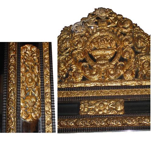 A Fine Flemish Brass Repoussé and Ebonized Carved Wood Mirror No. 2534 A Fine Flemish Brass Repoussé and Ebonized Carved Wood Mirror No. 2534