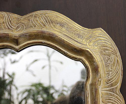A Mid-20th Century Shaped Parcel-Gilt and White Polychrome Mirror No. 4176 A Mid-20th Century Shaped Parcel-Gilt and White Polychrome Mirror No. 4176