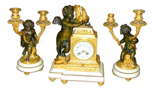 A French Louis XVI Style Parcel-Gilt, Marble and Bronze Garniture Set No. 1304