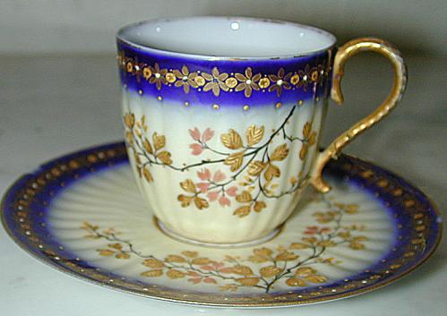 A Miniature Porcelain Cup & Saucer No. 1201